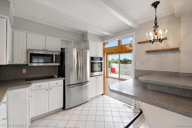 8569 Cooley Beach Dr, White Lake, MI 48386 - kitchen with appliances with stainless steel finishes, a chandelier, backsplash, white cabinetry, and beam ceiling