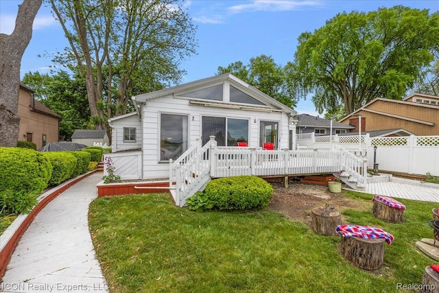 8569 Cooley Beach Dr, White Lake, MI 48386 - view of front of home featuring a deck
