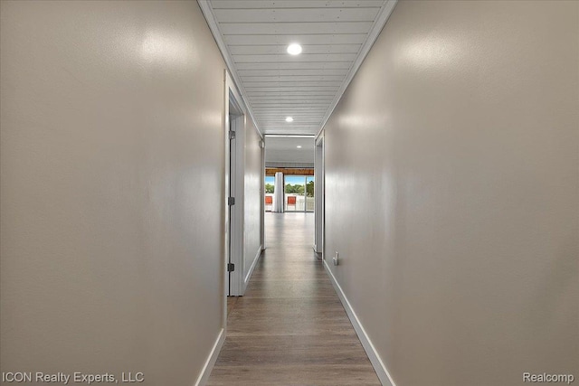 8569 Cooley Beach Dr, White Lake, MI 48386 - hallway with baseboards, dark wood-style floors, and recessed lighting