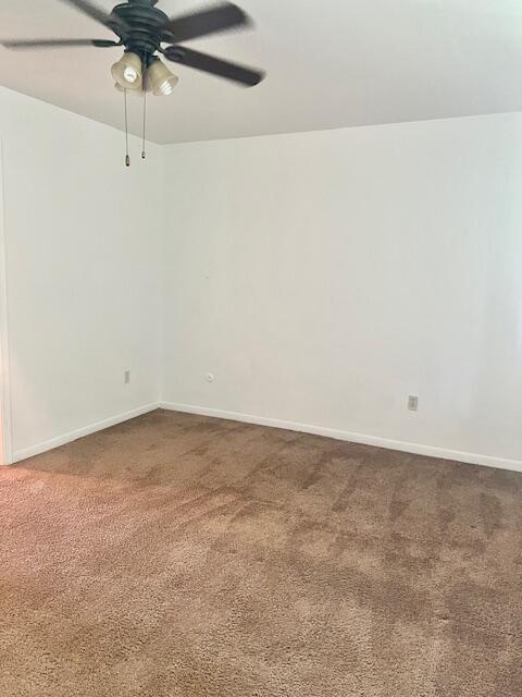 19160 Winston St Unit 206, Detroit, MI 48219 - carpeted empty room with a ceiling fan and baseboards