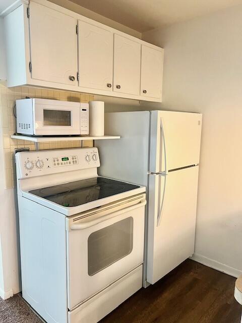 19160 Winston St Unit 206, Detroit, MI 48219 - kitchen with white appliances, baseboards, white cabinetry, and dark wood-type flooring