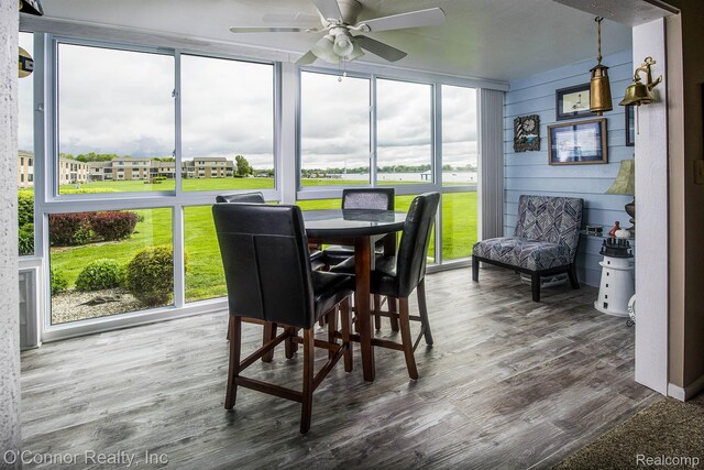 1660 River Rd Unit 52, Marysville, MI 48040 - sunroom / solarium featuring healthy amount of natural light, a ceiling fan, and wood finished floors
