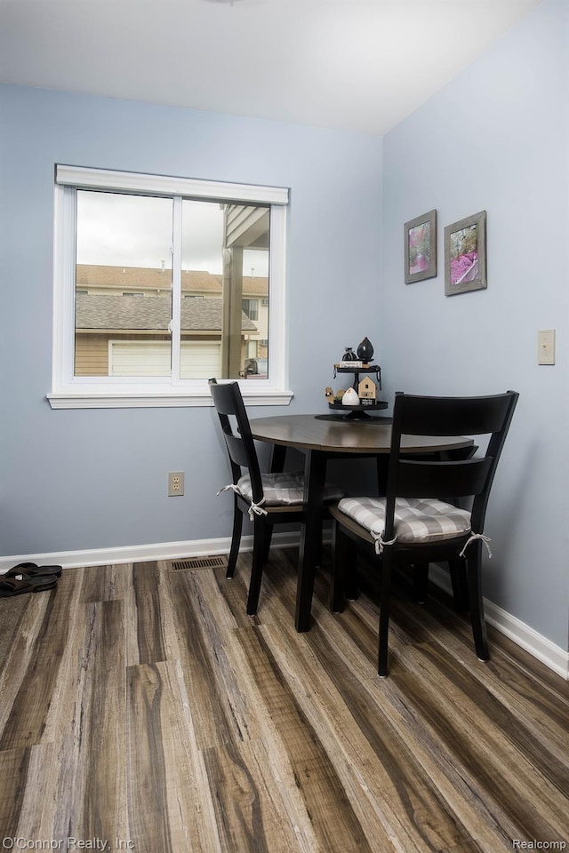 1660 River Rd Unit 52, Marysville, MI 48040 - dining area with wood finished floors and baseboards