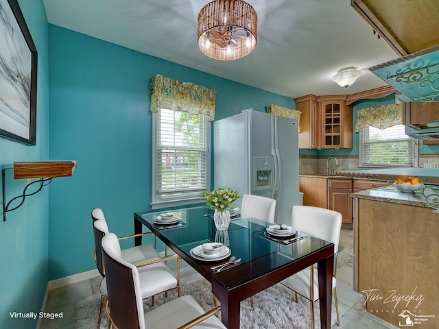 619 Parkwood Ave, Monroe, MI 48162 - dining space featuring baseboards