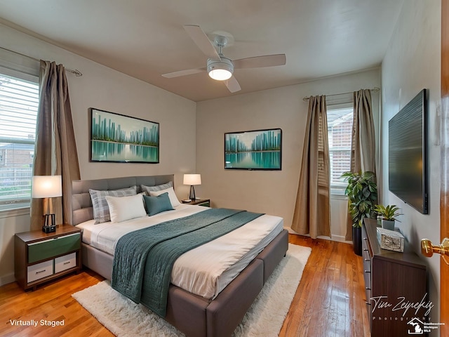 619 Parkwood Ave, Monroe, MI 48162 - bedroom featuring light wood finished floors and a ceiling fan