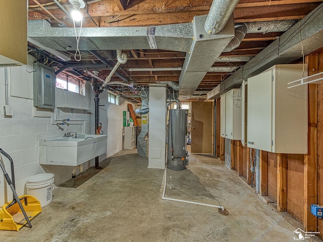 619 Parkwood Ave, Monroe, MI 48162 - basement featuring gas water heater, electric panel, and a sink