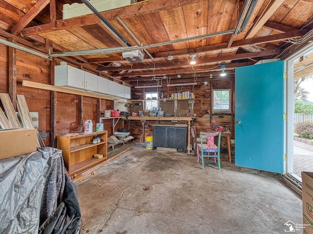 619 Parkwood Ave, Monroe, MI 48162 - garage with a garage door opener and a workshop area