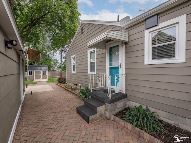 619 Parkwood Ave, Monroe, MI 48162 - doorway to property featuring a patio
