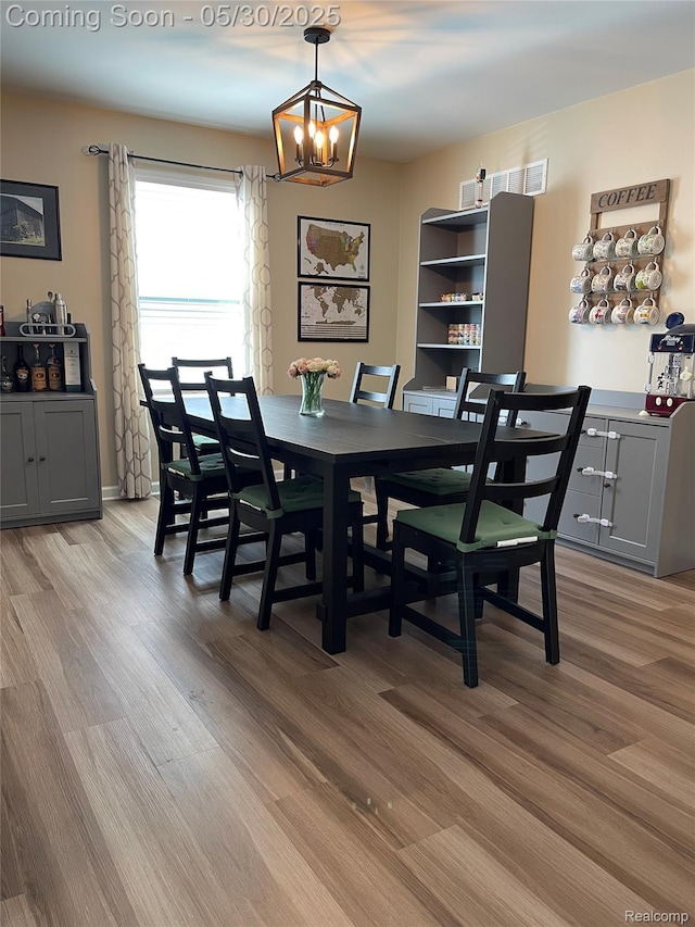 33500 Birchlawn, Westland, MI 48185 - dining room featuring a chandelier and light wood-type flooring