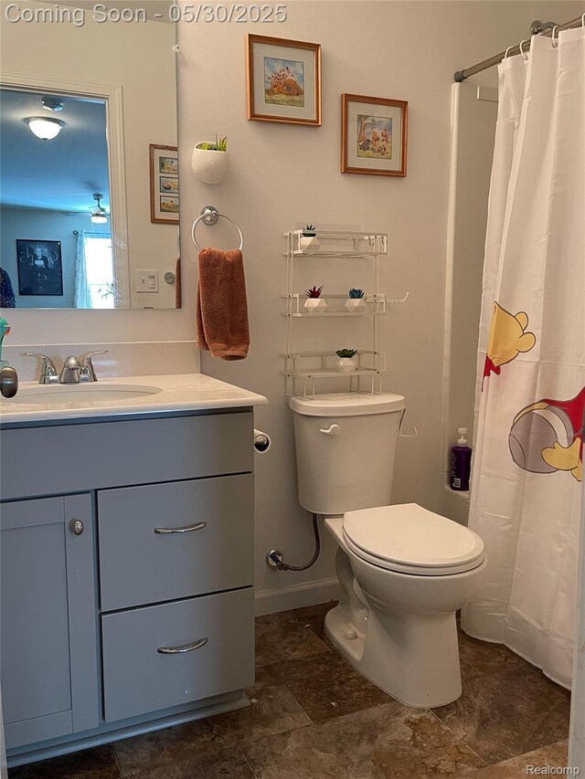 33500 Birchlawn, Westland, MI 48185 - full bathroom with vanity, toilet, baseboards, and a shower with shower curtain