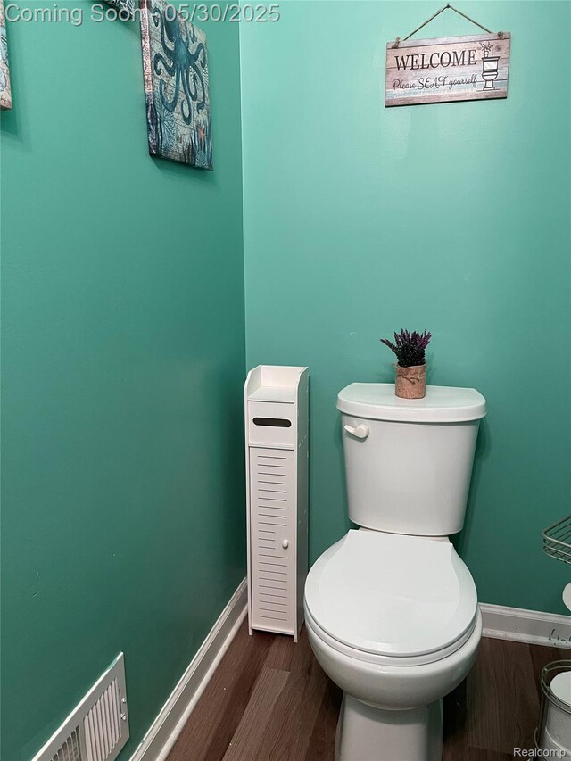 33500 Birchlawn, Westland, MI 48185 - bathroom featuring toilet, wood finished floors, and baseboards