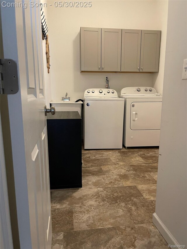 33500 Birchlawn, Westland, MI 48185 - laundry area with cabinet space, independent washer and dryer, baseboards, and stone finish flooring