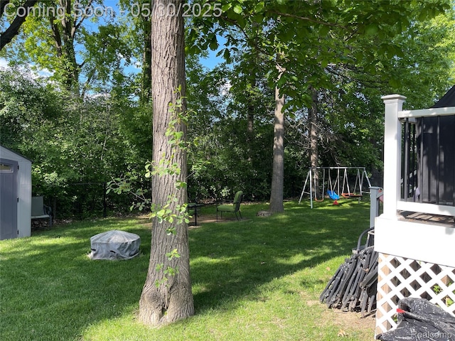 33500 Birchlawn, Westland, MI 48185 - view of green lawn featuring a playground