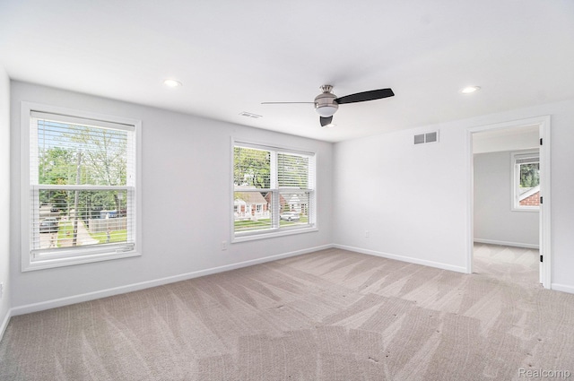 1508 Gardenia Ave, Royal Oak, MI 48067 - unfurnished room featuring light carpet, baseboards, a ceiling fan, and recessed lighting