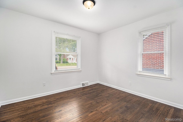 1508 Gardenia Ave, Royal Oak, MI 48067 - unfurnished room with dark wood finished floors and baseboards