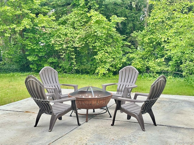 1508 Gardenia Ave, Royal Oak, MI 48067 - view of patio featuring a fire pit
