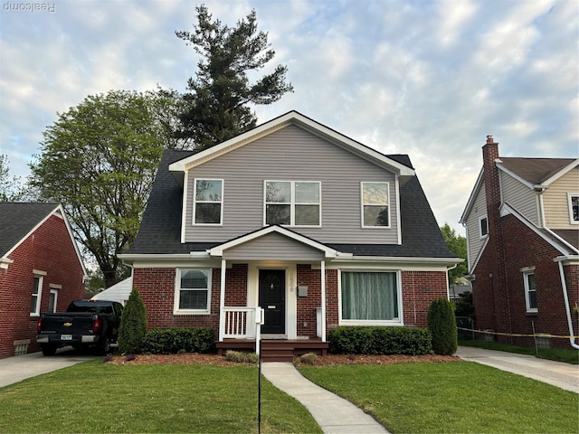 1508 Gardenia Ave, Royal Oak, MI 48067 - view of front facade with brick siding and a front yard