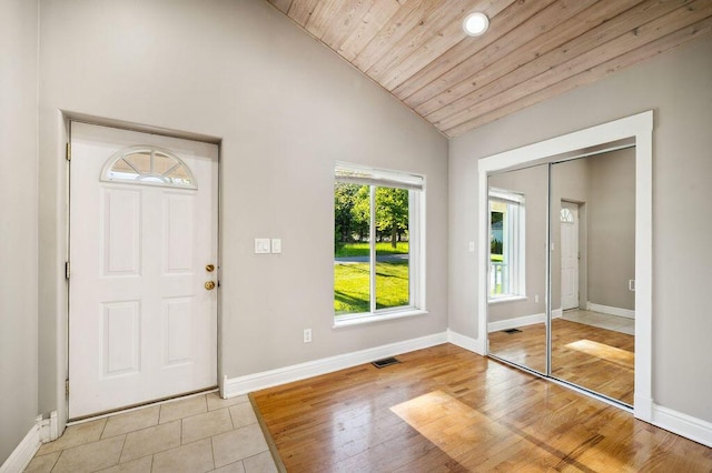 4530 Douglas Ter, Coloma, MI 49038 - foyer featuring lofted ceiling, wooden ceiling, baseboards, and light wood-type flooring