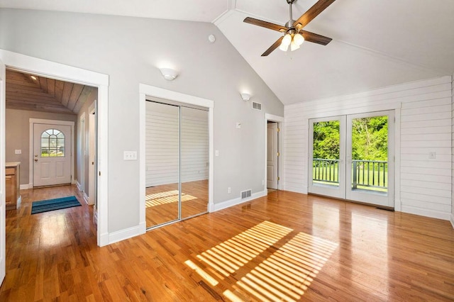 4530 Douglas Ter, Coloma, MI 49038 - unfurnished bedroom featuring multiple windows, access to outside, light wood-type flooring, a closet, and high vaulted ceiling