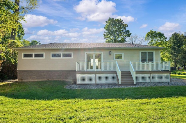 4530 Douglas Ter, Coloma, MI 49038 - rear view of house with a wooden deck and a lawn