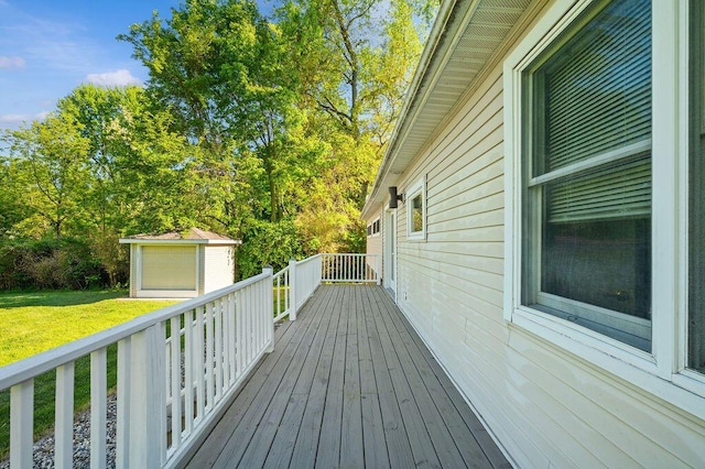 4530 Douglas Ter, Coloma, MI 49038 - wooden deck featuring a lawn and a detached garage