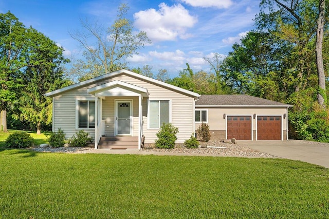 4530 Douglas Ter, Coloma, MI 49038 - view of front of home featuring a garage, driveway, and a front yard