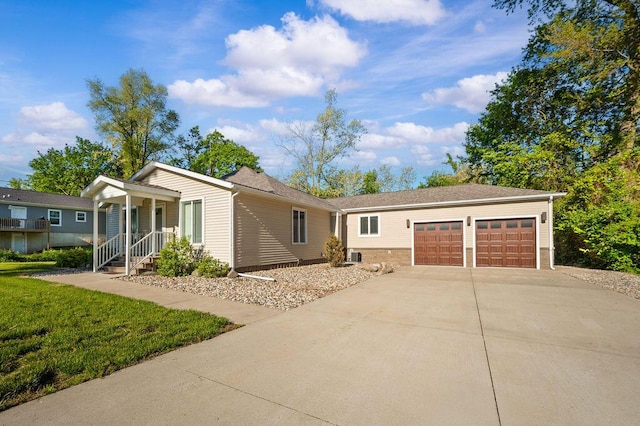4530 Douglas Ter, Coloma, MI 49038 - ranch-style house featuring an attached garage, driveway, and a front yard