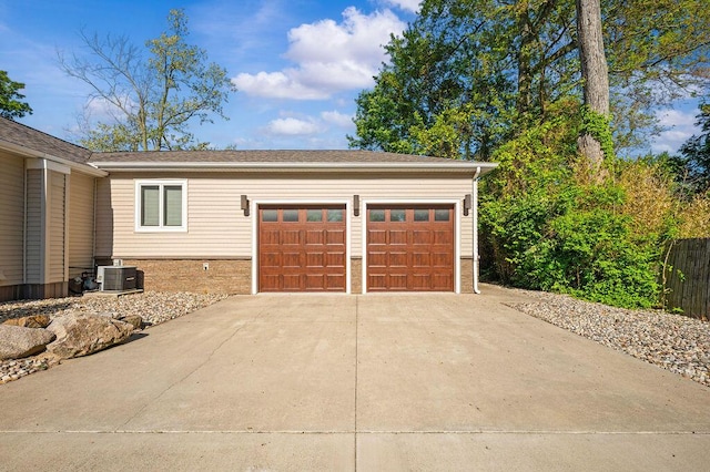 4530 Douglas Ter, Coloma, MI 49038 - garage with central AC unit and concrete driveway