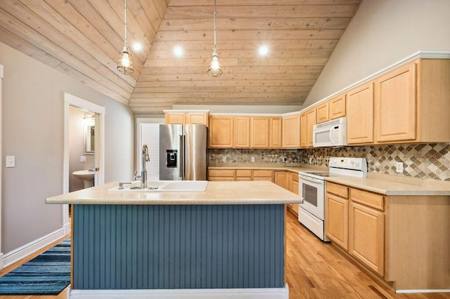 4530 Douglas Ter, Coloma, MI 49038 - kitchen with white appliances, light brown cabinets, lofted ceiling, a sink, and decorative backsplash