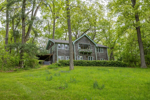 5436 Strawberry Lake Rd, Whitmore Lake, MI 48189 - rear view of property featuring central AC unit and a deck
