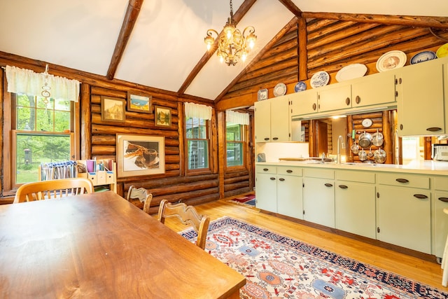 5436 Strawberry Lake Rd, Whitmore Lake, MI 48189 - dining space featuring log walls, light wood-style floors, high vaulted ceiling, beam ceiling, and a chandelier