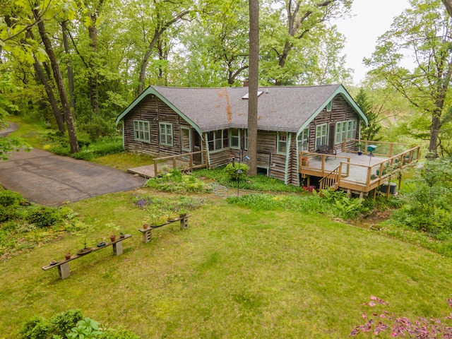 5436 Strawberry Lake Rd, Whitmore Lake, MI 48189 - rear view of property with a deck, roof with shingles, and a yard