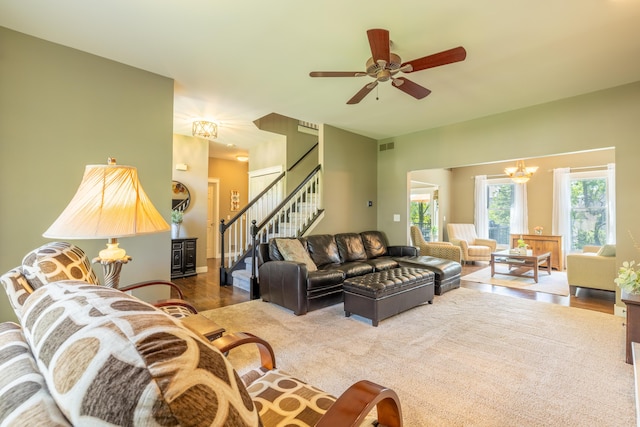 1050 Long Leaf Ct, Brighton, MI 48116 - living area with stairs, wood finished floors, and ceiling fan