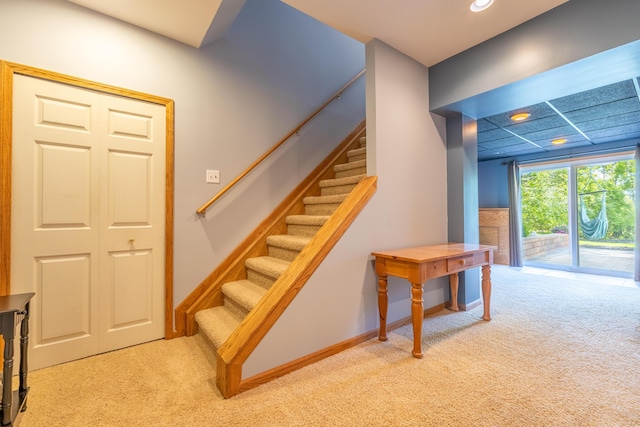 1050 Long Leaf Ct, Brighton, MI 48116 - stairs featuring carpet floors, recessed lighting, and baseboards