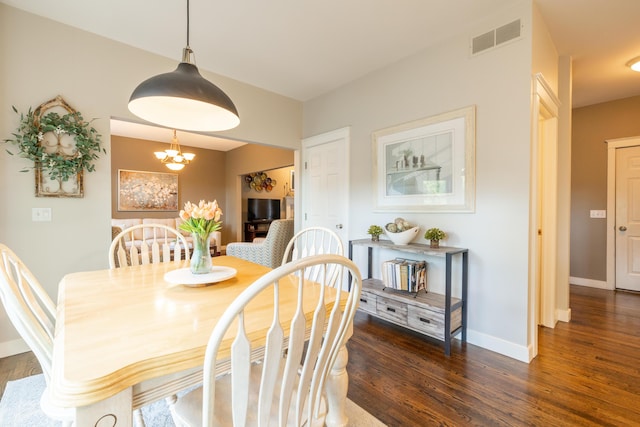 1050 Long Leaf Ct, Brighton, MI 48116 - dining room with wood finished floors, baseboards, and a chandelier