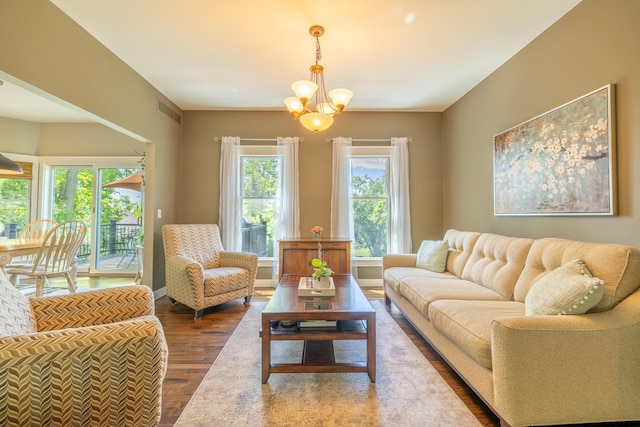 1050 Long Leaf Ct, Brighton, MI 48116 - living area with wood finished floors and a chandelier