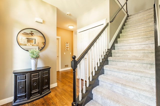 1050 Long Leaf Ct, Brighton, MI 48116 - stairs with wood finished floors and baseboards