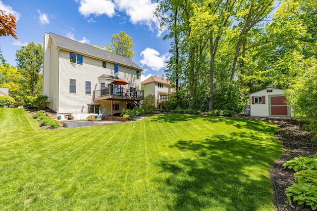 1050 Long Leaf Ct, Brighton, MI 48116 - back of house with a wooden deck, a patio, and a lawn