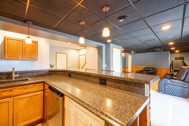 1050 Long Leaf Ct, Brighton, MI 48116 - kitchen featuring a sink, white dishwasher, dark countertops, open floor plan, and dishwasher