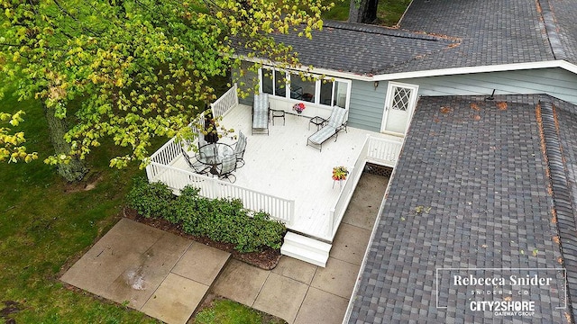 9409 Whitneyville Ave SE, Alto, MI 49302 - view of wooden deck