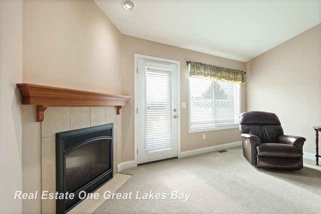 32 Tuscany Cir, Saginaw, MI 48603 - sitting room with carpet and a fireplace