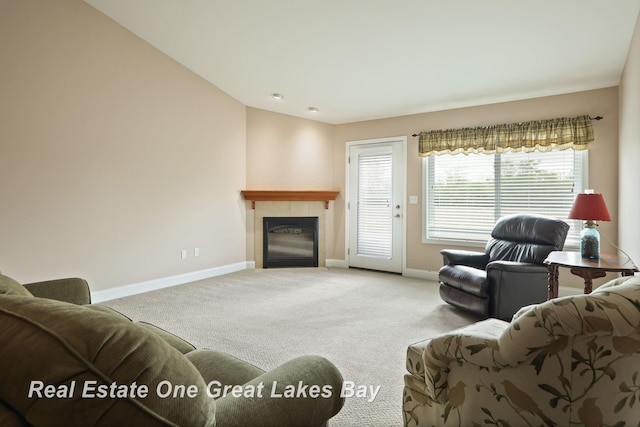 32 Tuscany Cir, Saginaw, MI 48603 - living area with baseboards, carpet floors, and a fireplace