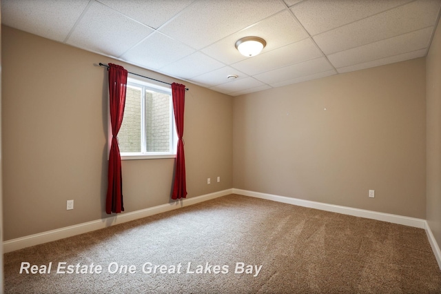 32 Tuscany Cir, Saginaw, MI 48603 - carpeted spare room with a paneled ceiling and baseboards