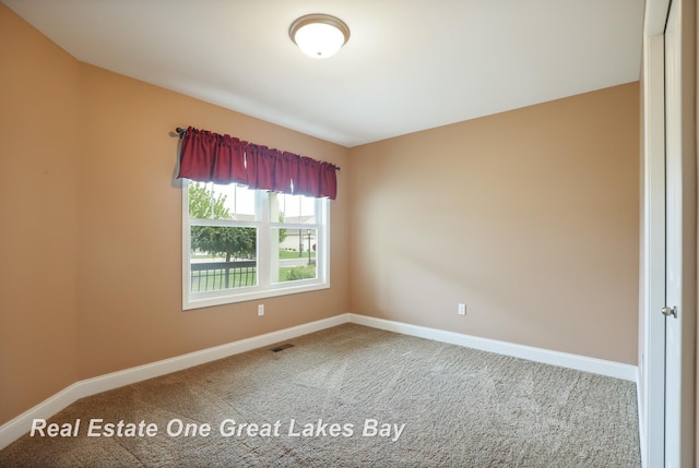 32 Tuscany Cir, Saginaw, MI 48603 - empty room with carpet flooring and baseboards