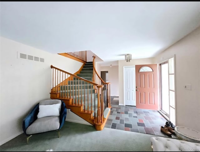 31929 Cambridge Dr, Clinton Township, MI 48093 - entrance foyer featuring stairway and baseboards