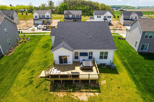 2771 Silo Dr, Saline, MI 48176 - back of house featuring a residential view, a wooden deck, and central air condition unit