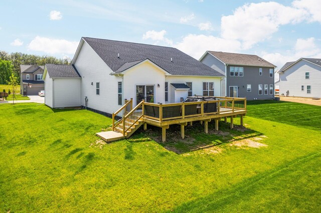 2771 Silo Dr, Saline, MI 48176 - back of house featuring a wooden deck, a yard, and roof with shingles