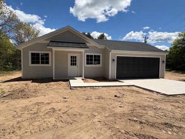 8121 Bowens Mill Rd, Middleville, MI 49333 - single story home with an attached garage and concrete driveway