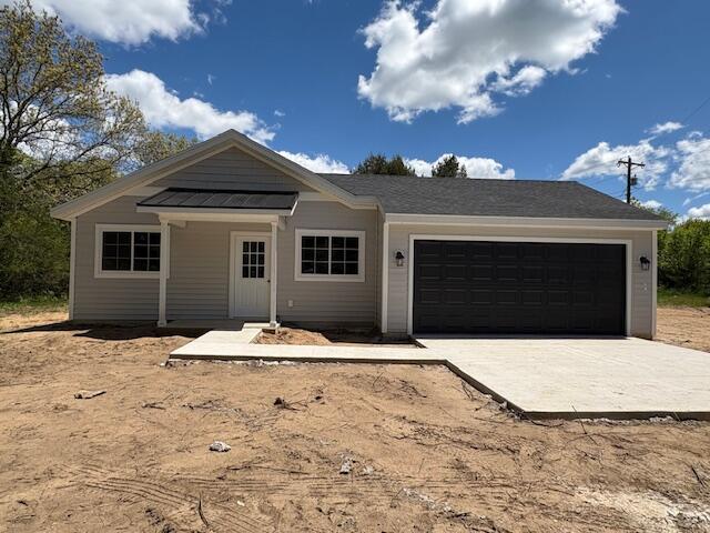 8121 Bowens Mill Rd, Middleville, MI 49333 - ranch-style home featuring an attached garage and driveway