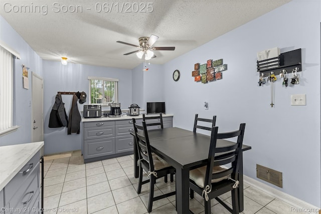 5908 Gilman St, Garden City, MI 48135 - dining area with a ceiling fan, a textured ceiling, light tile patterned floors, and an office area